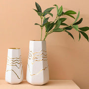 vase blanc et dore