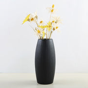 vase noire fleurs