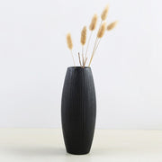 vase noir fleurs